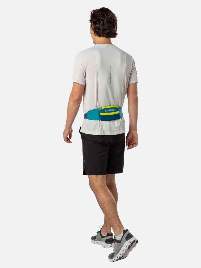 color:Storm Green/Finish Lime||seo:Nathan 5K Waist Running Belt - Storm Green/Finish Lime - On Model - Side View