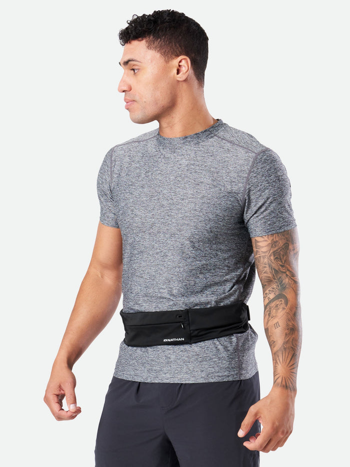 color:Black||view:SKU Image On Body||index:1||seo:Nathan Adjustable-Fit Zipster 2.0 Black Training Waist Belt – On Model – Front View