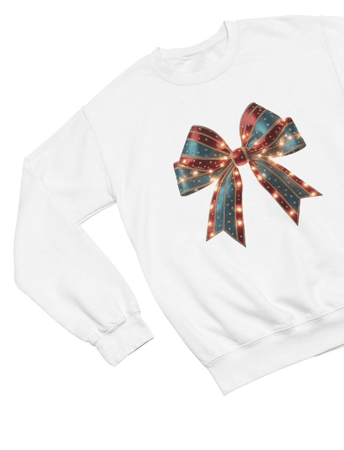 white sweatshirt with vintage-style coquette christmas bow and glittery details
