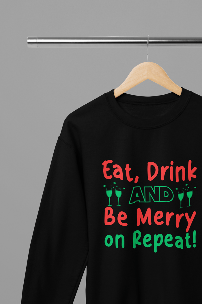 black sweatshirt with eat drink be merry repeat funny christmas design