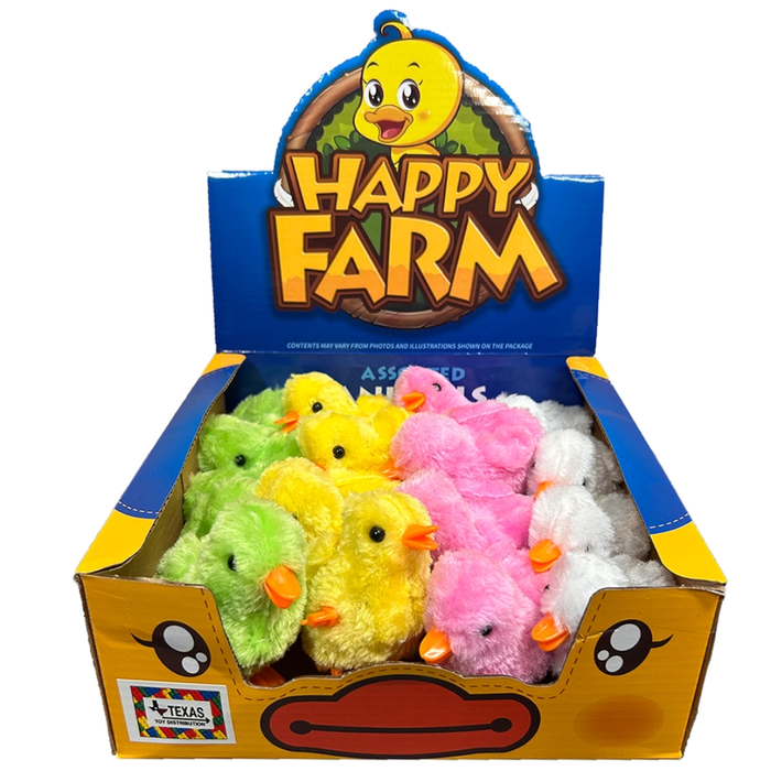 Display box of colorful fuzzy wind-up chicks in green, yellow, pink, and white under a “Happy Farm” sign.