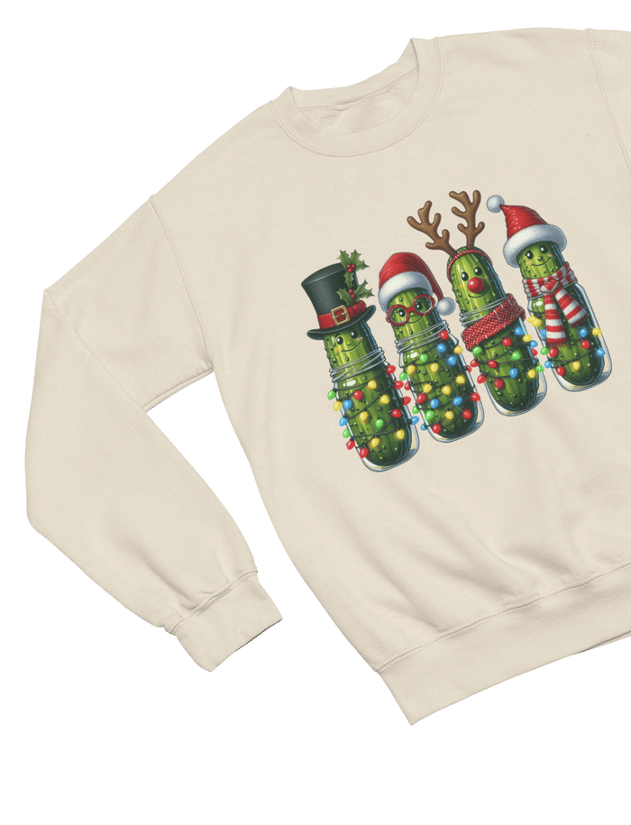 beige sweatshirt with funny pickle characters in Christmas spirit design