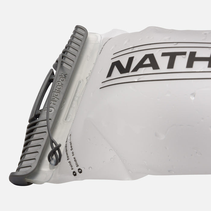 color:Clear||seo:Detail Shot of patented Hydrapak Slide-Seal™ Top that opens wide for quick filling and closes tight for a leakproof seal on NATHAN 1.5 Liter BPA-Free Hydration Bladder