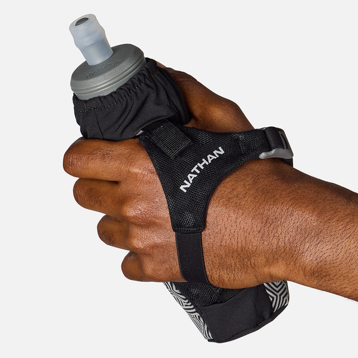 color:Black/Hex Print||seo:HyperNight Pinnacle 14oz Soft Flask - Black/Hex Print -Model Gripping Handheld Flask - Back View