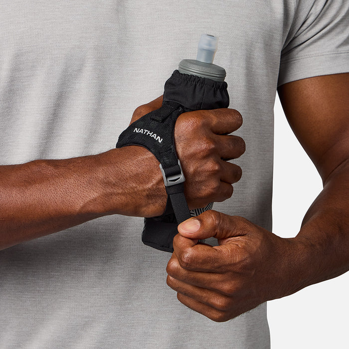 color:Black/Hex Print||seo:HyperNight Pinnacle 14oz Soft Flask - Black/Hex Print -Model Gripping Handheld Flask - Back View