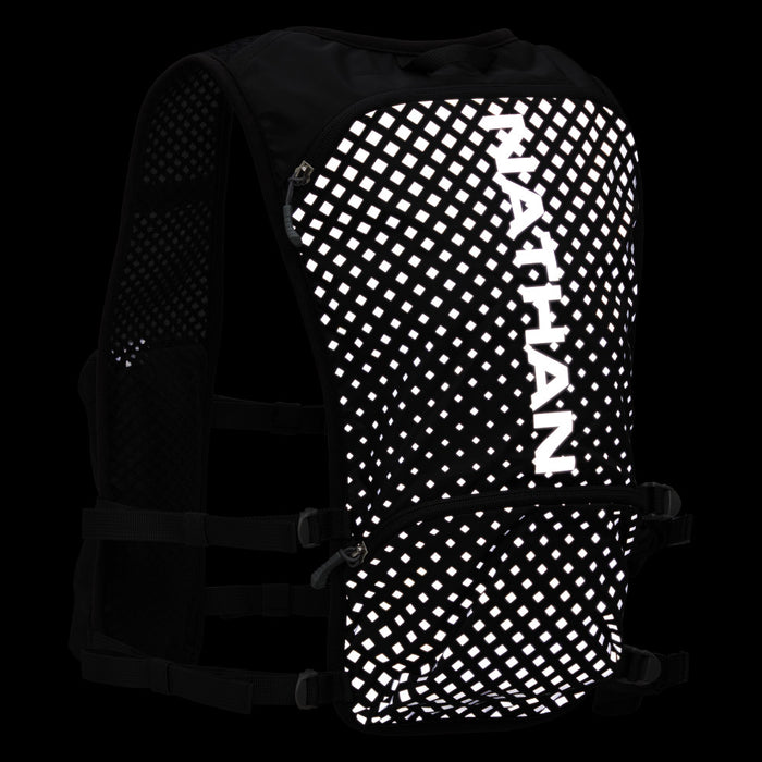 color:Black/Geo Print||seo:Nathan Hypernight QuickStart 2.0 4 Liter Hydration Pack - Black/Geo Print - Reflective Detail View (Back of Vest)