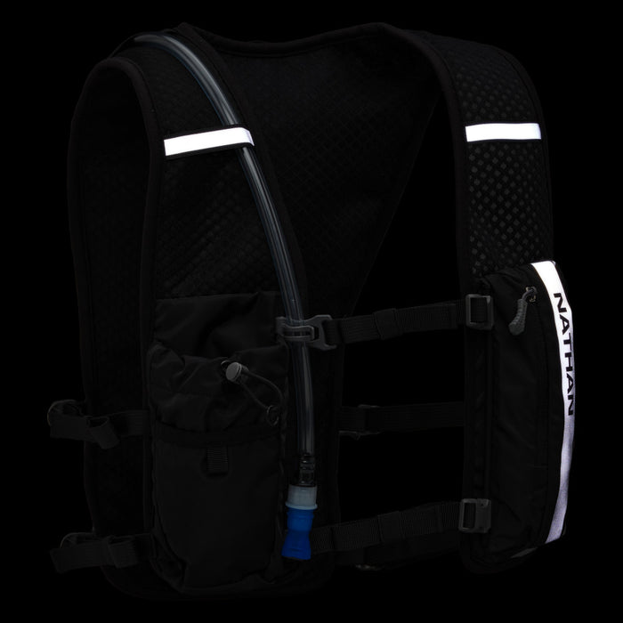 color:Black/Geo Print||seo:Nathan Hypernight QuickStart 2.0 4 Liter Hydration Pack - Black/Geo Print - Reflective Detail View (Front of Vest)