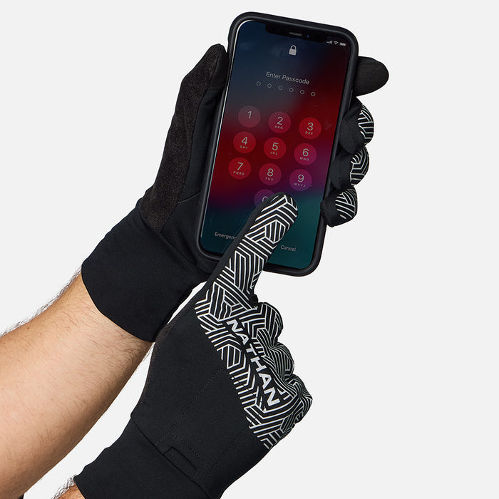 color:Black/Hex Print||seo:Nathan HyperNight Reflective Gloves 2 -Black/Hex Print - Model Unlocking Cell Phone with Gloves On