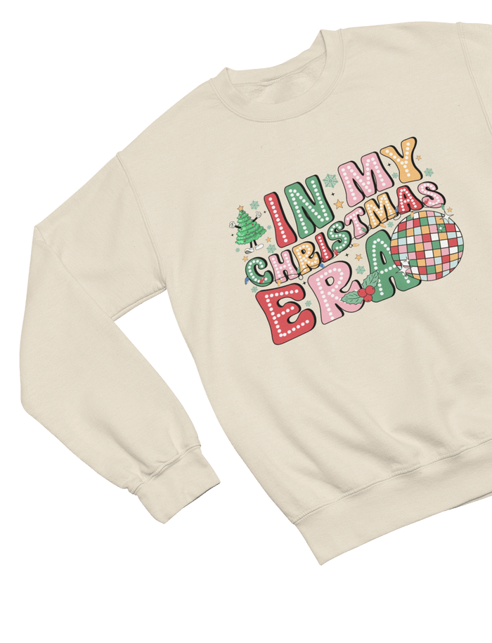 beige sweatshirt with retro christmas era slogan and disco theme