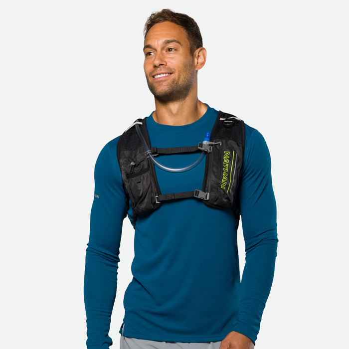 color:Black/High Vis Yellow||seo:Nathan Laser Light 3L Hydration Pack – Black/High Vis Yellow – On Model – Front View