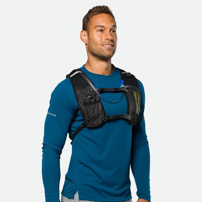color:Black/High Vis Yellow||seo:Nathan Laser Light 3L Hydration Pack – Black/High Vis Yellow – On Model – Side Front View