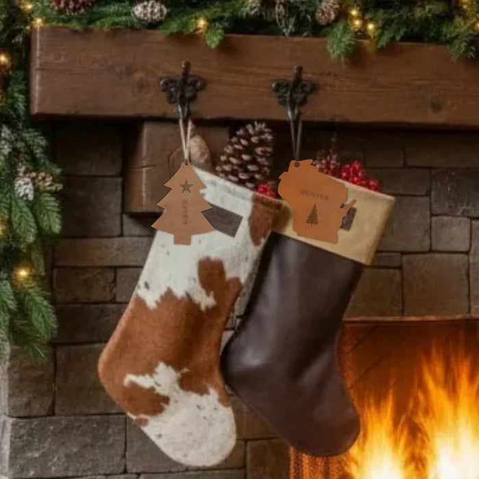 Two Christmas stockings hanging by a fireplace with a stone wall background. #color_tan