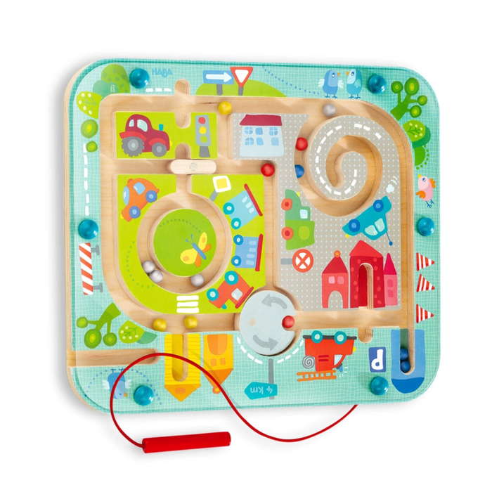 Colorful town-themed magnetic maze board with roads, cars, buildings, and a red stylus attached by a cord.