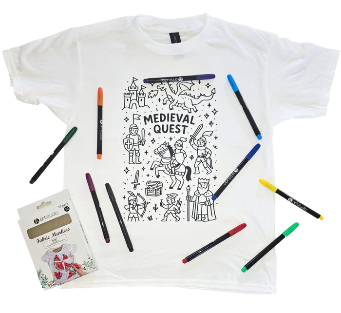 child wearing completed mini chef colour-in t-shirt with coloured fabric markers