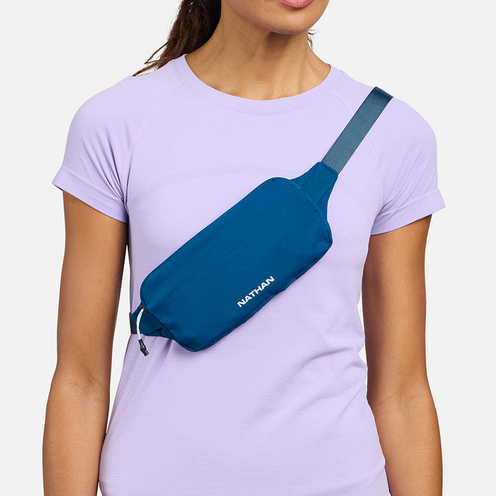 color:Sailor Blue/Light Blue||seo:Nathan Marathon Waist Pack 3.0 - Sailor Blue/Light Blue - On Model - Cross Body Over Shoulder