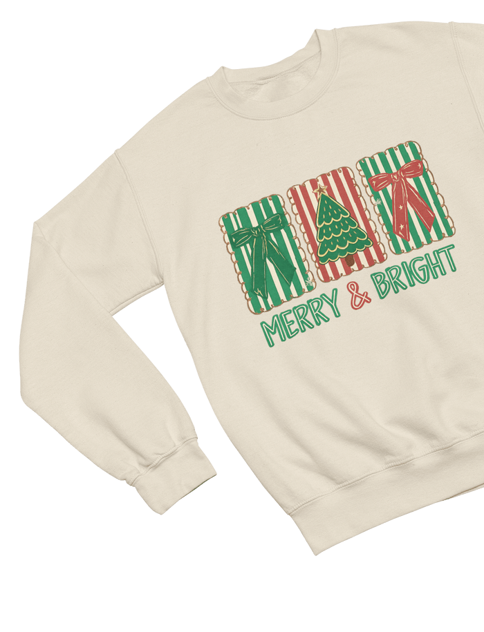 beige sweatshirt with colorful christmas cookie biscuit and bow graphic