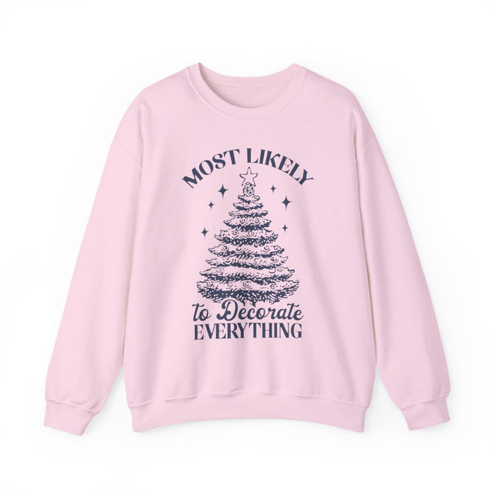 white sweatshirt with most likely to decorate everything holiday saying