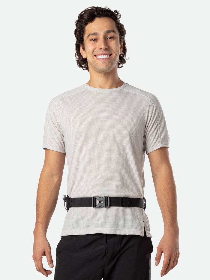 color:Black/Gold||seo:Nathan Peak Hydration Waist Pack - Black/Gold - On Model - Front of Pack