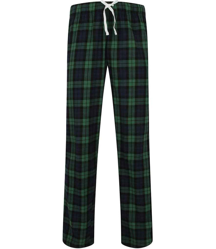 green matching family Christmas pyjamas with personalised surname design