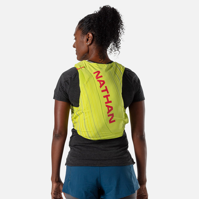 color:Finish Lime/Hibiscus||seo:Nathan Pinnacle 12 Liter Women's Hydration Race Vest - Finish Lime/Hibiscus Red - Female Runner Back View