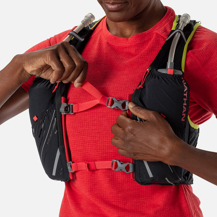color:Black/Hibiscus||seo:Nathan Pinnacle 4 Liter Women's Hydration Race Vest - Black/Hibiscus Red - Female Runner Tightening Straps on Vest For Better Fit