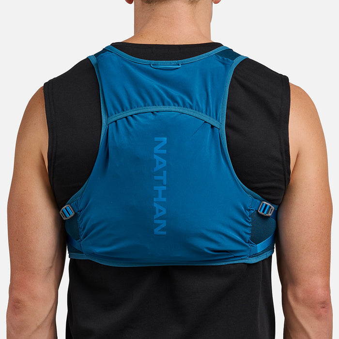 color:Sailor Blue/Deep Blue||seo:Nathan Pinnacle Breeze 4 Liter Unisex Hydration Race Vest - Sailor Blue/Deep Blue - Male Runner Back View