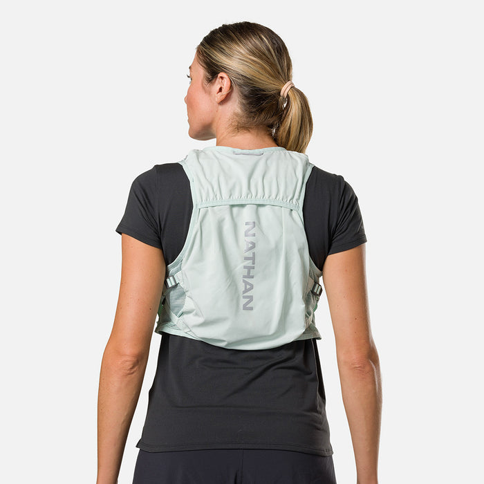 color:Surf Spray/Reflective Silver||seo:Nathan Pinnacle Breeze 4 Liter Women's Hydration Race Vest - Surf Spray/Reflective Silver - Female Runner Back View