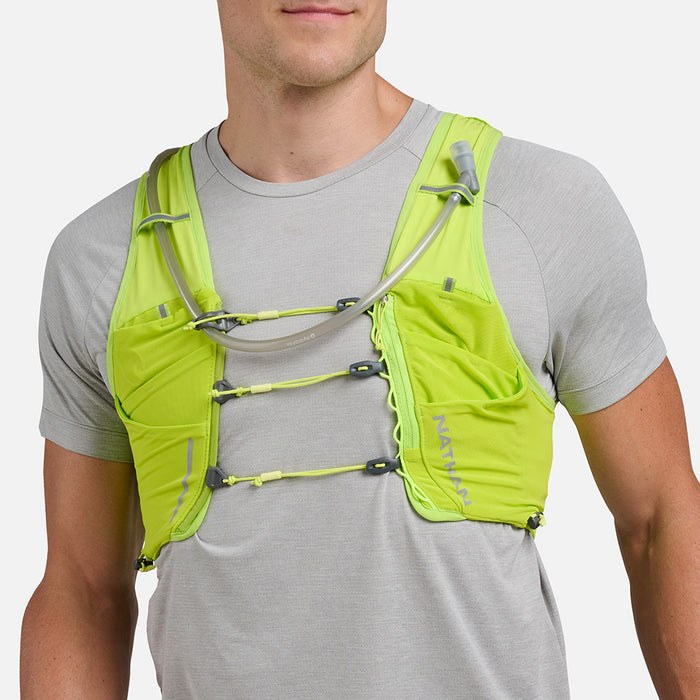 color:Finish Lime/Reflective Silver||seo:Nathan Pinnacle Pro 12 Liter Unisex Hydration Race Vest - Finish Lime/Reflective Silver - Male Runner Front View