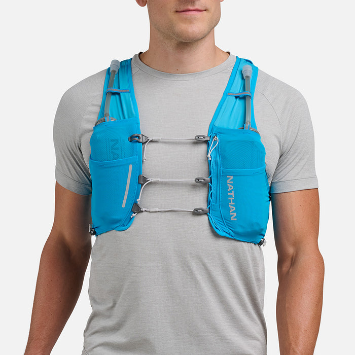 color:Electric Blue/Reflective Silver||seo:Nathan Pinnacle Pro 6 Liter Unisex Hydration Race Vest - Electric Blue/Reflective Silver - Male Runner Front View