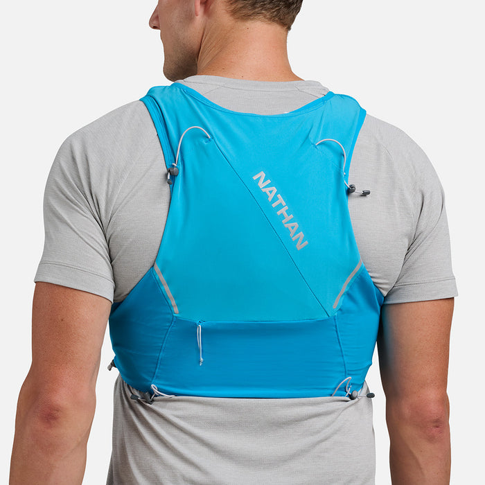 color:Electric Blue/Reflective Silver||seo:Nathan Pinnacle Pro 6 Liter Unisex Hydration Race Vest - Electric Blue/Reflective Silver - Male Runner Back View