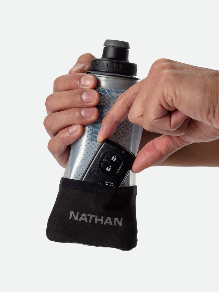 color:Black/Marine Blue||seo:NATHAN QuickSqueeze Lite 12oz Insulated Handheld - Black/Marine Blue - Runner Pulling Out Key Fob From Pocket of Handheld