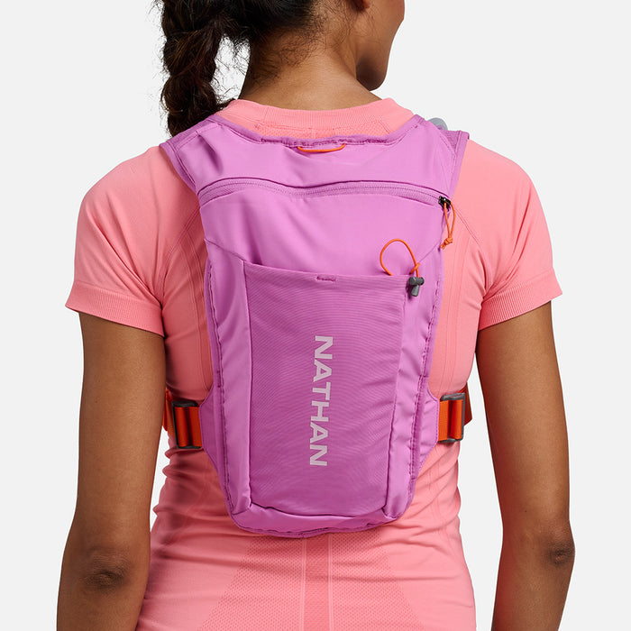 color:Fuchsia/Orange Blaze||seo:Nathan QuickStart 3.0 4 Liter Hydration Pack - Fuchsia/Orange Blaze - On Model - Back View