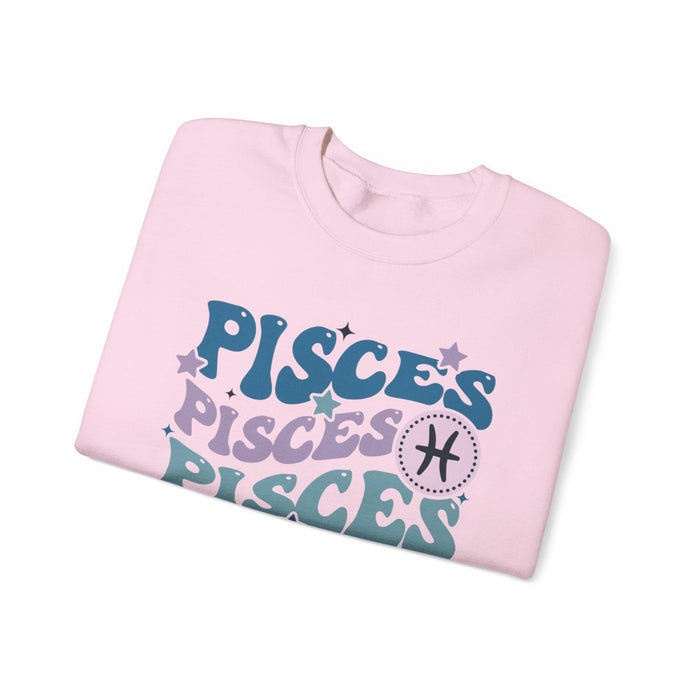 close-up of retro Pisces zodiac sweatshirt print showing groovy typography and celestial details