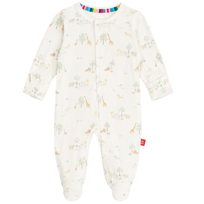 Cream white baby footed zip sleeper featuring an allover neutral safari animal print with giraffes, elephants, lions, and trees.