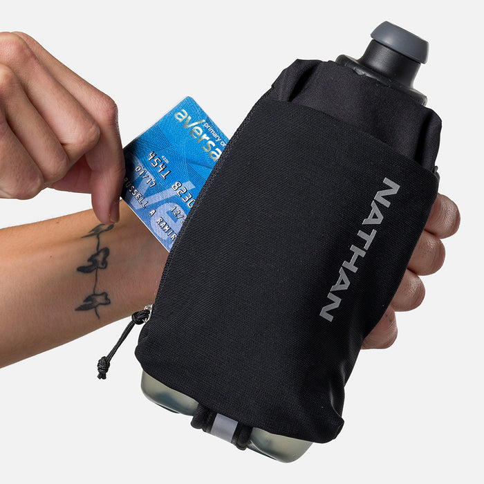color:Black/Reflective Silver||seo:Nathan SpeedDraw 2 18oz Flask - Black/Reflective Silver - Model Pulling Credit Card from Zippered Pouch
