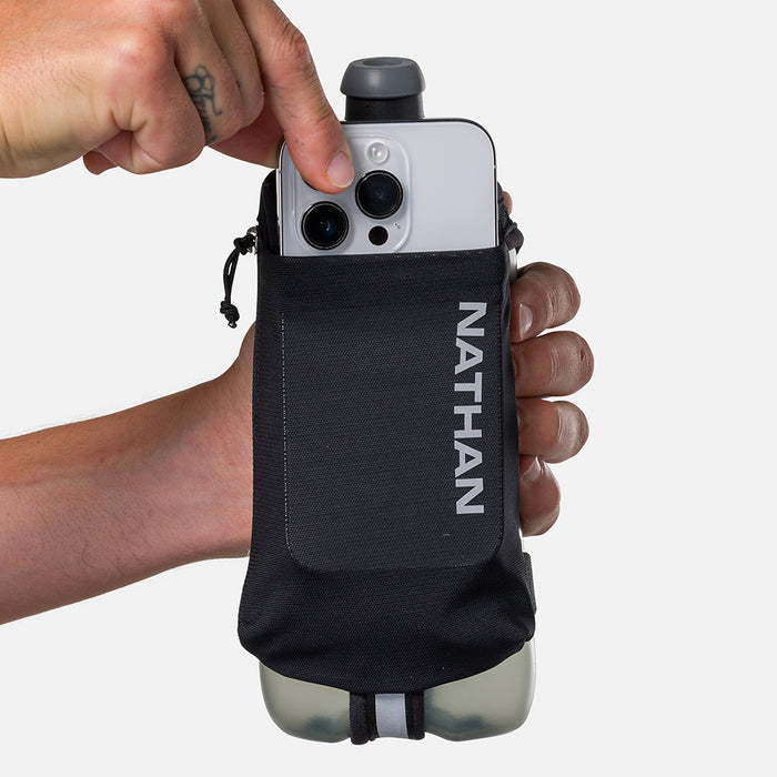 color:Black/Reflective Silver||seo:Nathan SpeedDraw 2 22oz Handheld Flask  - Black/Reflective Silver - Model Pulling iPhone from Pouch