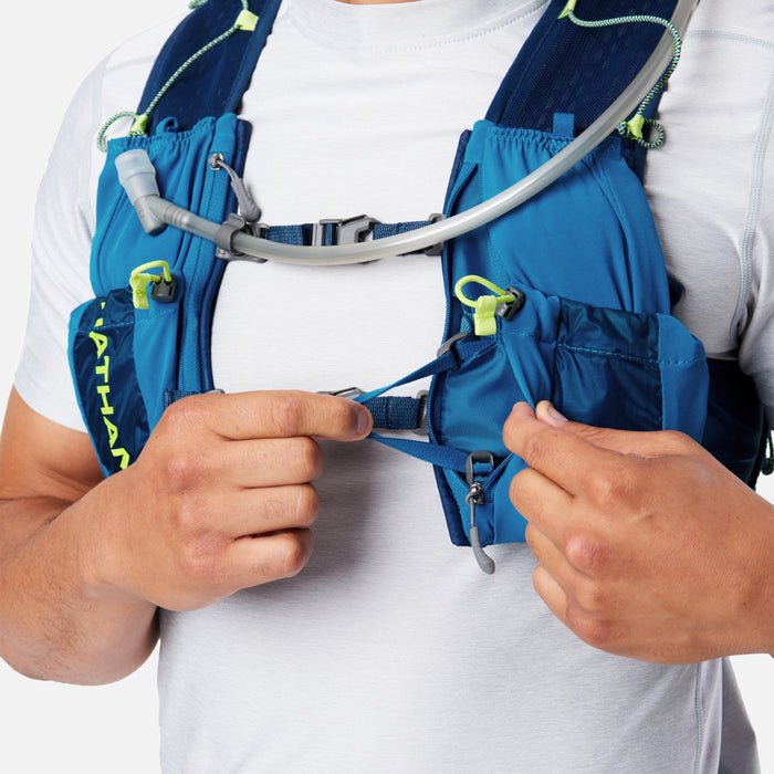 color:Deep Blue/Safety Yellow||seo:Nathan VaporAir 3.0 7 Liter Men's Hydration Pack - Deep Blue/Safety Yellow - On Model - Model Tightening Straps For Better Fit