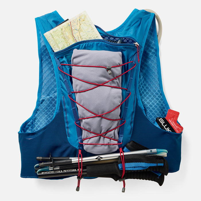 color:Electric Blue/Ribbon Rede||view:SKU image primary||seo:VaporAir 4.0 8 Liter Unisex Hydration Pack - Electric Blue/Ribbon Red - Showcasing Multiple Back Pockets That Can Be Used For Maps, Energy Gels, and Pole Keepers