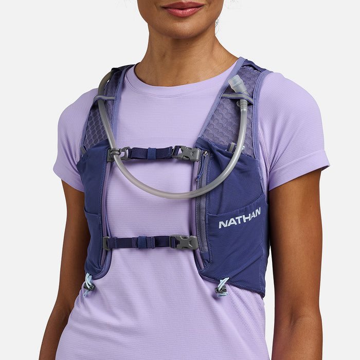 color:Indigo/Light Blue||seo:VaporAiress 4.0 8 Liter Women's Hydration Pack - Indigo/Light Blue - On Model -Front View