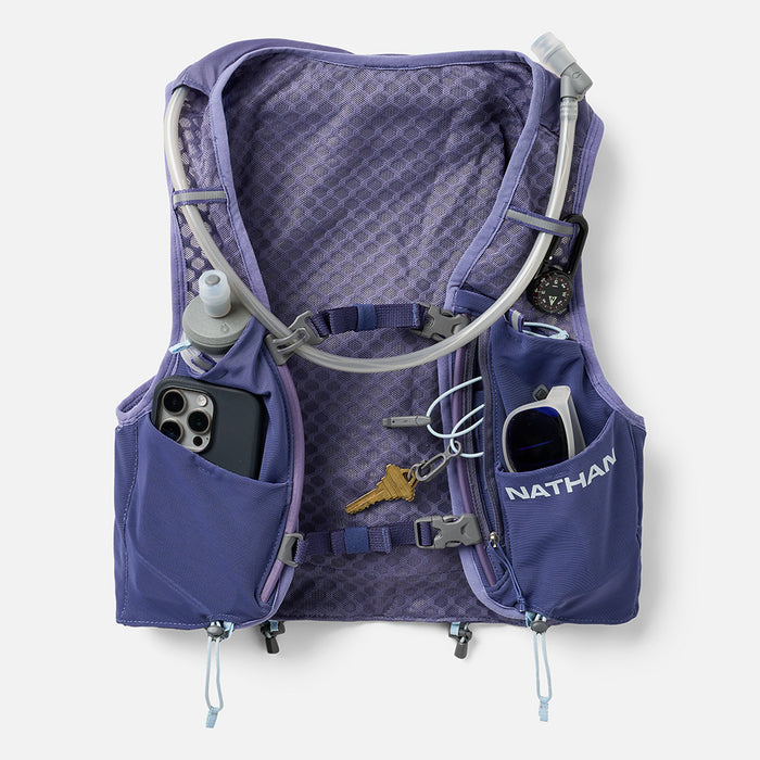 color:Indigo/Light Blue||seo:VaporAiress 4.0 8 Liter Women's Hydration Pack - Indigo/Light Blue  - Showcasing Multiple Front Pockets That Can Be Used For Phones, Sunglasses, Flasks & More