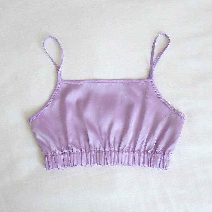 Lavender satin crop top on a white background